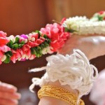 strings on wrist at traditional Thai wedding ceremony